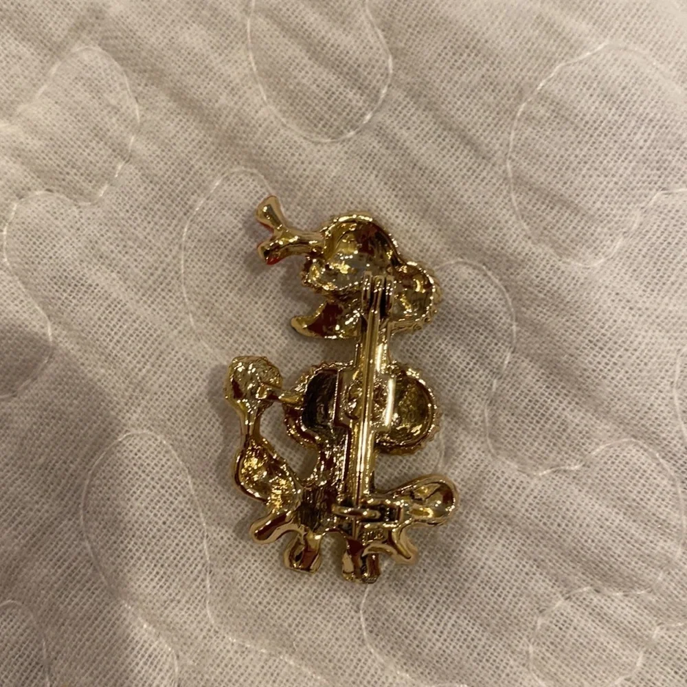 Gold tone poodle pins